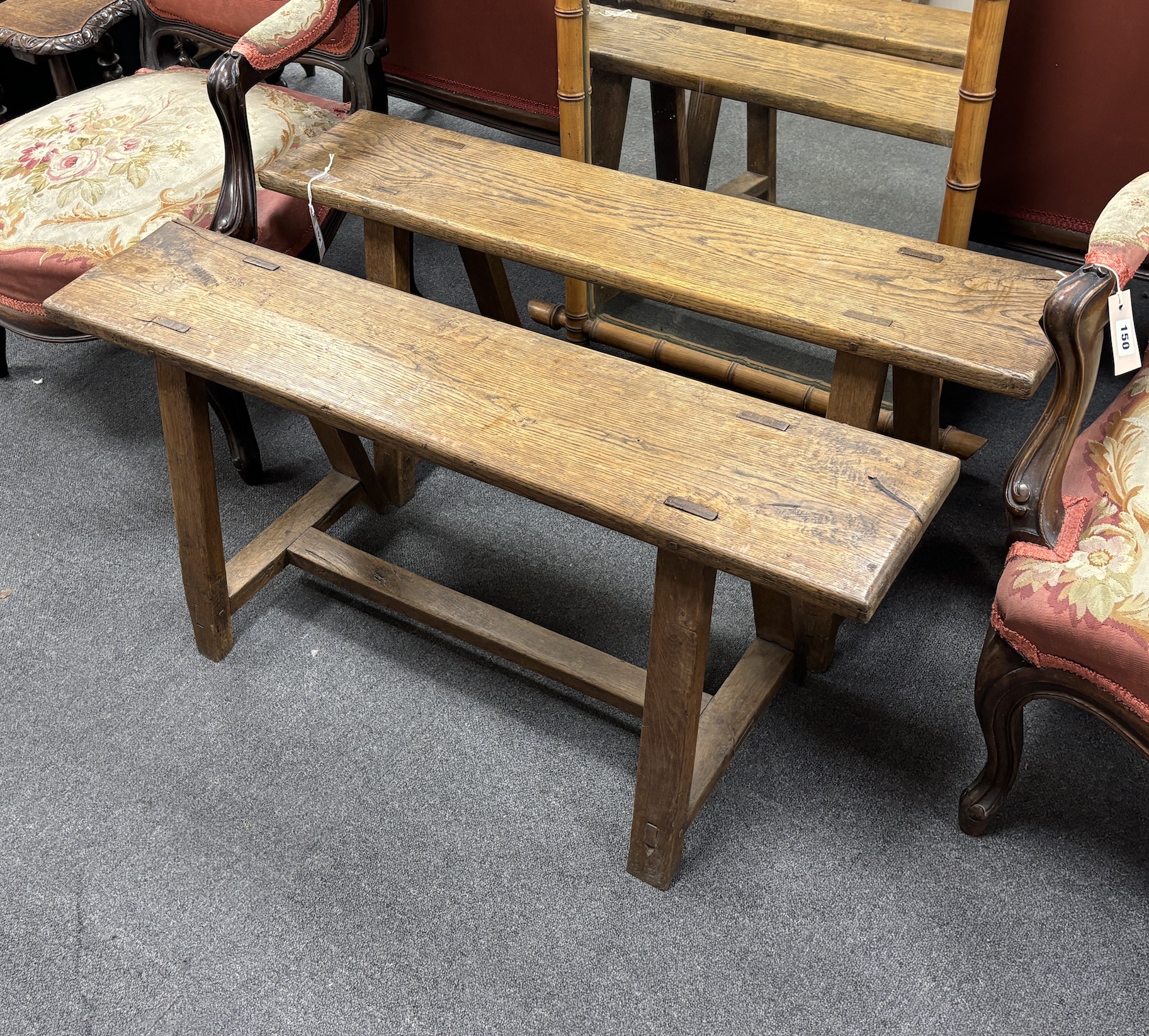 A pair of small late 19th century French oak benches, width 101cm, depth 21cm, height 46cm